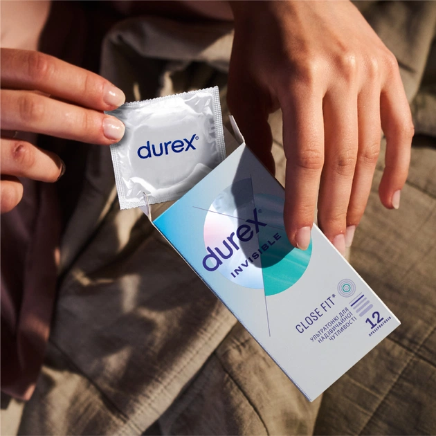 Презервативи Durex Іnvisible латексні з силіконовою змазкою ультратонкі 12 шт. (5052197049619) - picture 6