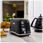 Тостер DeLonghi CTJ2103.BK - зменшене зображення 6