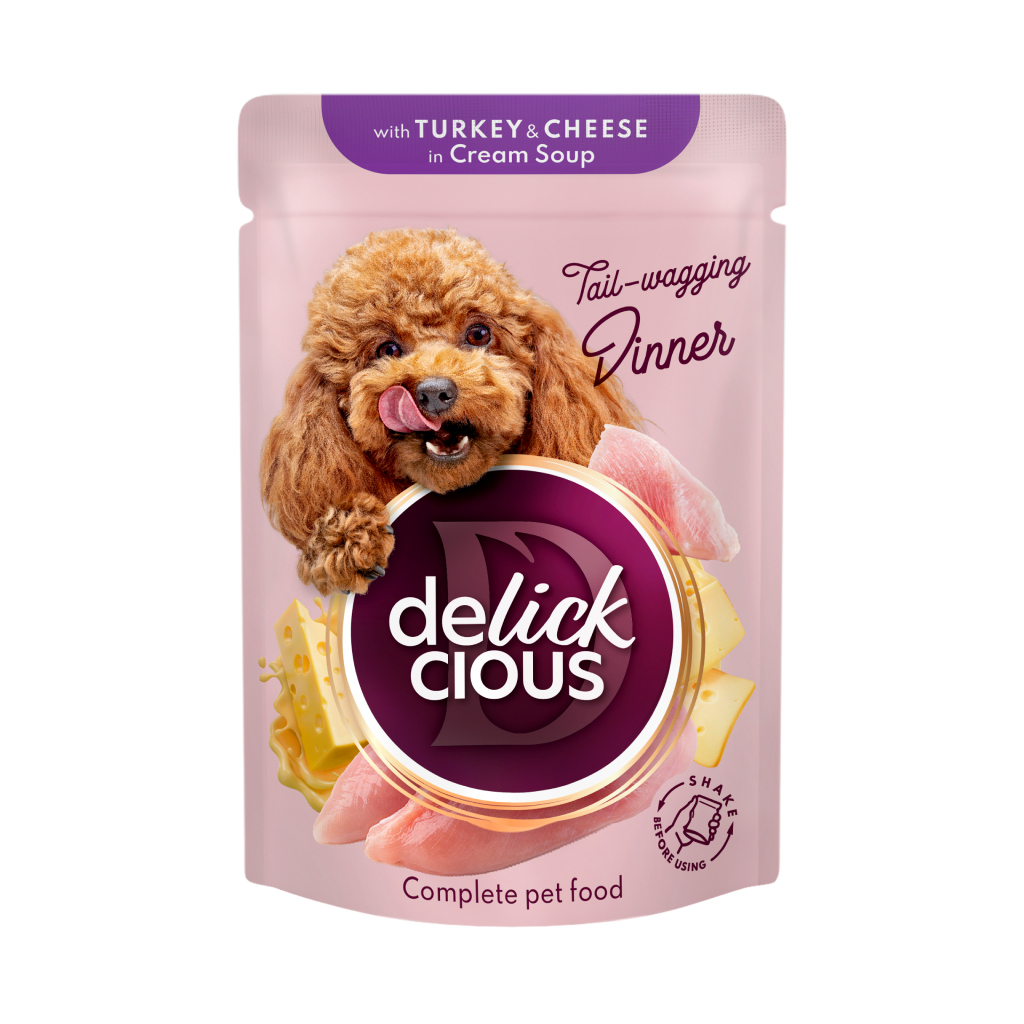 Вологий корм для собак Delickcious Смужки з індичкою та сиром в крем-супі 85 г (4820269141810) - зображення 1