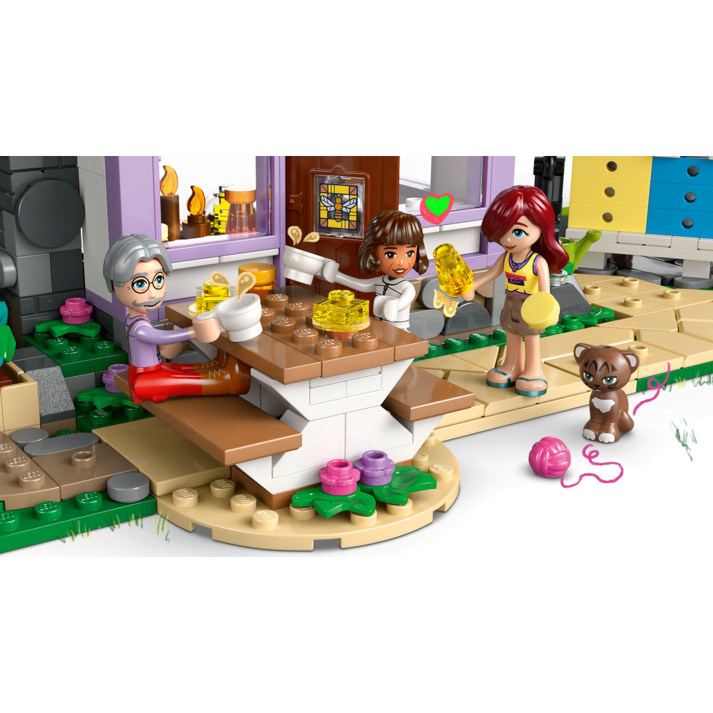 Конструктор LEGO Friends Будиночок і квітник бджолярів (42669) - зображення 5