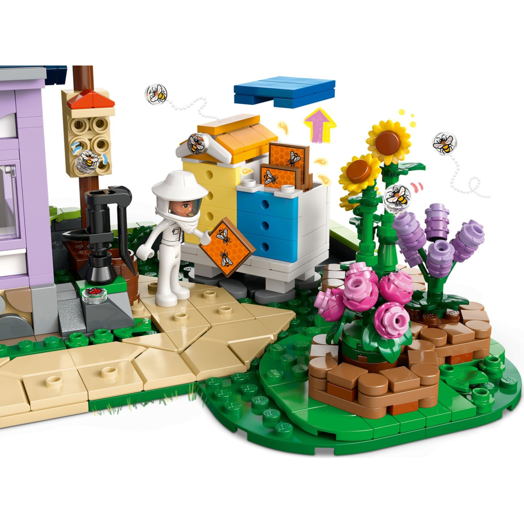 Конструктор LEGO Friends Будиночок і квітник бджолярів (42669) - зображення 4