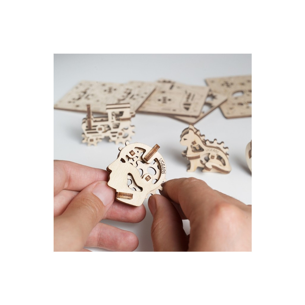 Збірна модель Ugears механічний Фіджет Трибики (70029) - зображення 3